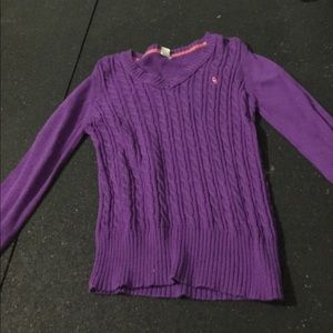 A purple sweater